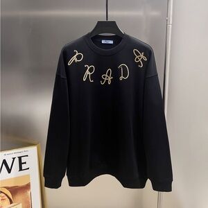 Prada Black Crewneck Sweater with Gold Accents